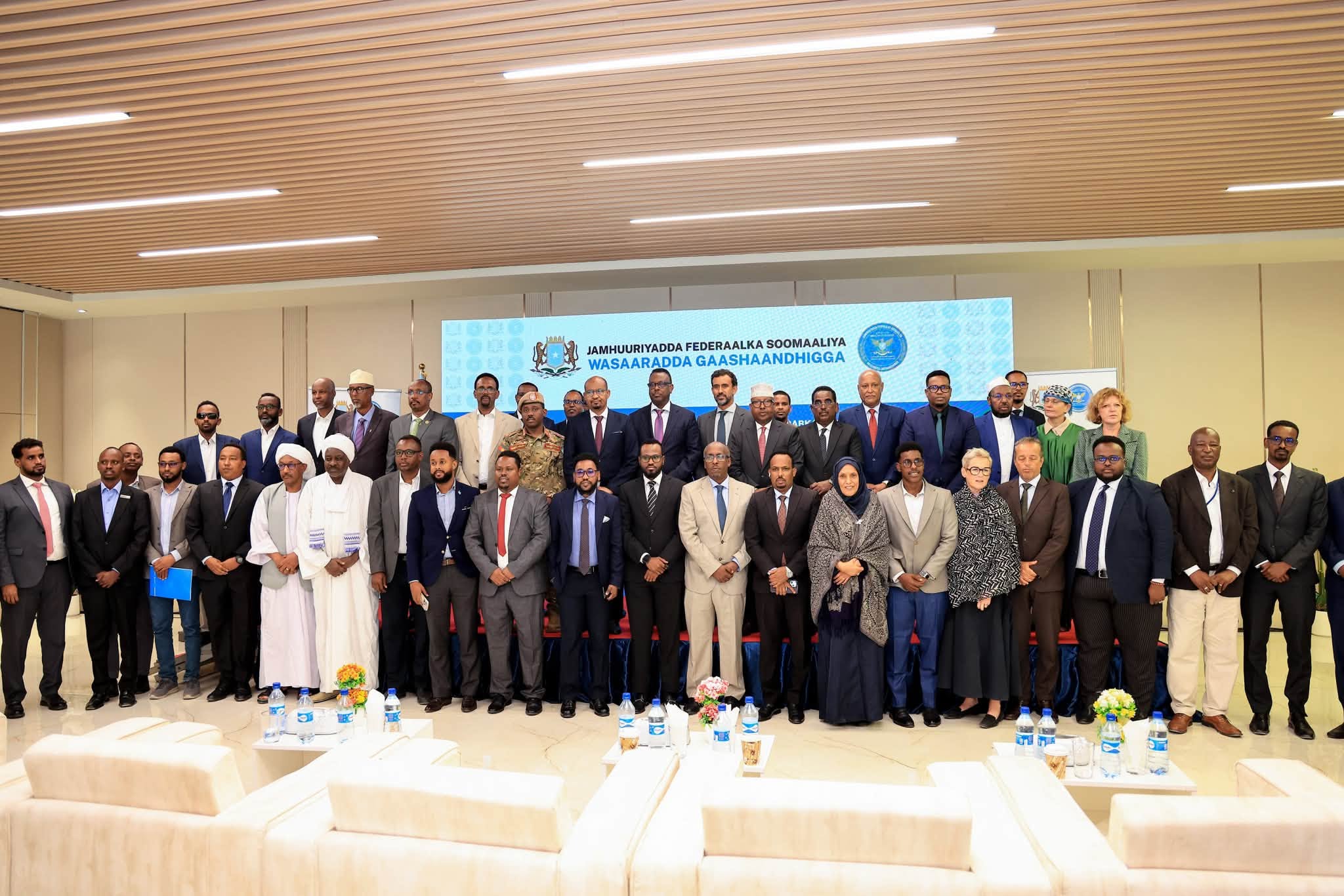 NIHRC Chairperson with government and security officials at the civilian protection policy launch